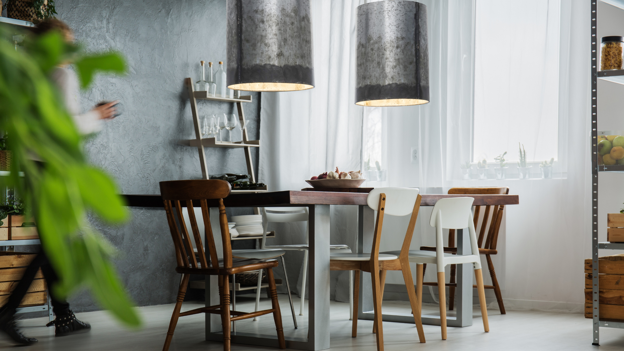 Cannery pendants shown over dining room table