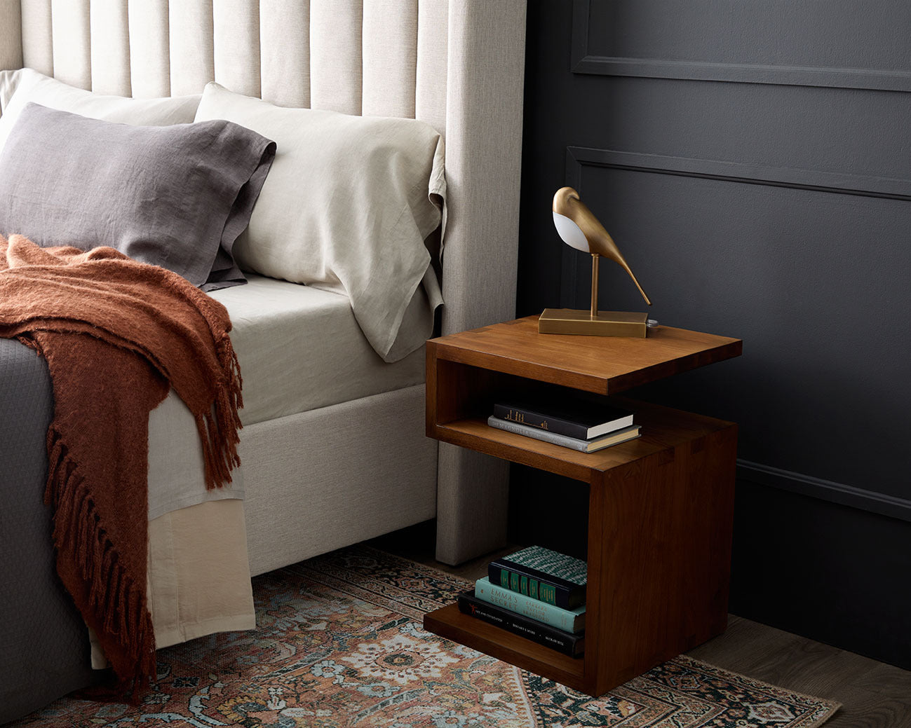 bird lamp on bedside table